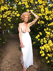 Mature Porn Model - 70 Years Old, Covered in Flowers