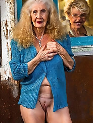 Irish Granny with Long Blonde Hair and Shocked Expression in Nude Pics