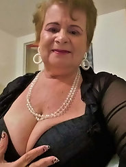 Sexual old gilf is spreading her pussy lips for money